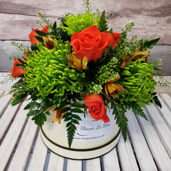 vibrant green-orange-hat box flower arrangement-gift flowers-mothers day