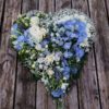 blue flowers-funeral flowers-heart design-heart tribute in white and blue flowers
