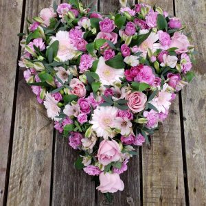 sweet memory heart-pink flowers-pink heart-funeral tribute-heart design in seasonal pink flowers-roses-germini-alstromeria